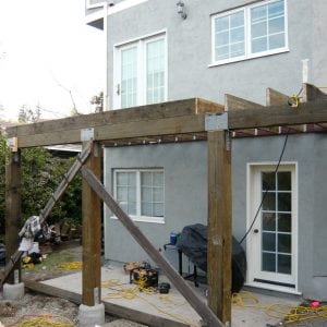Framing for an overhang on a new deck area building job